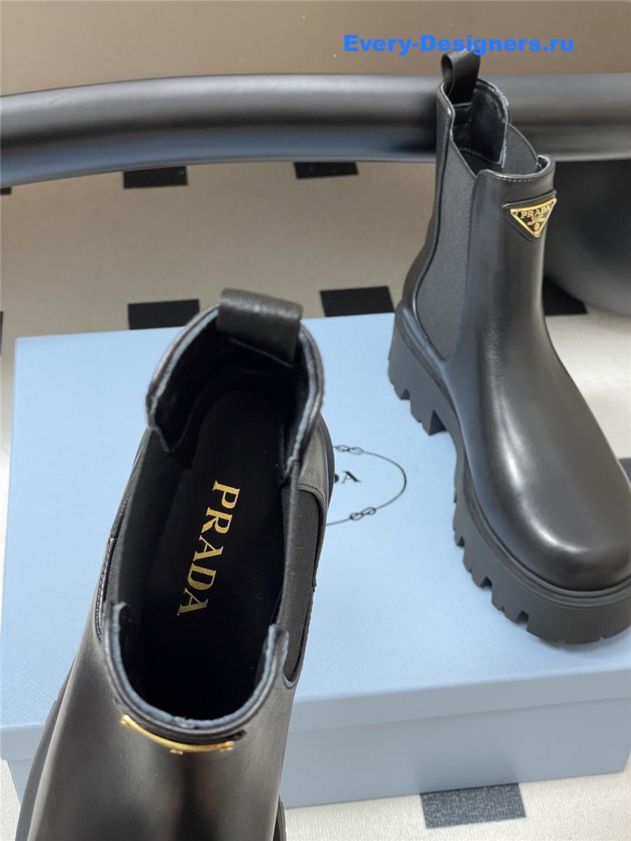 Pra*a black monolith brushed leather booties