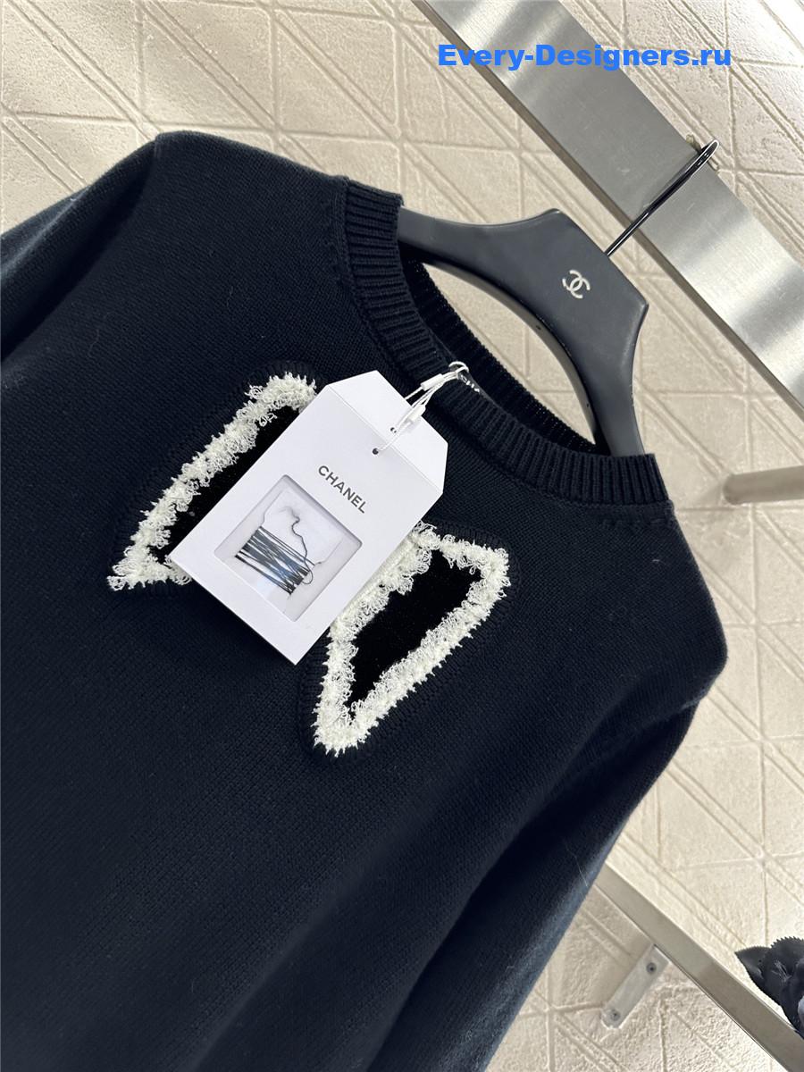 Ch**el black embroidered-bow sweater