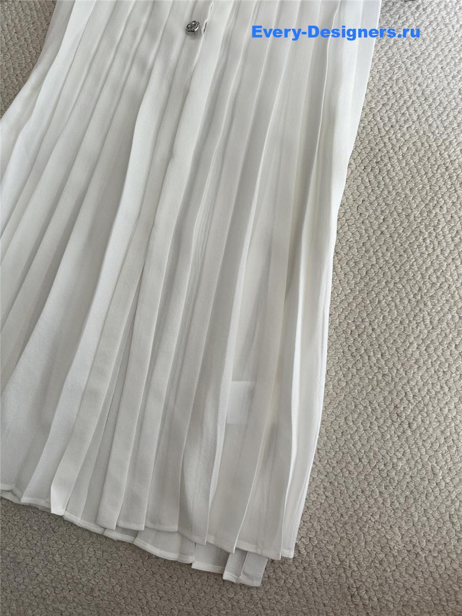 Ch**el white pleated sleeveless top