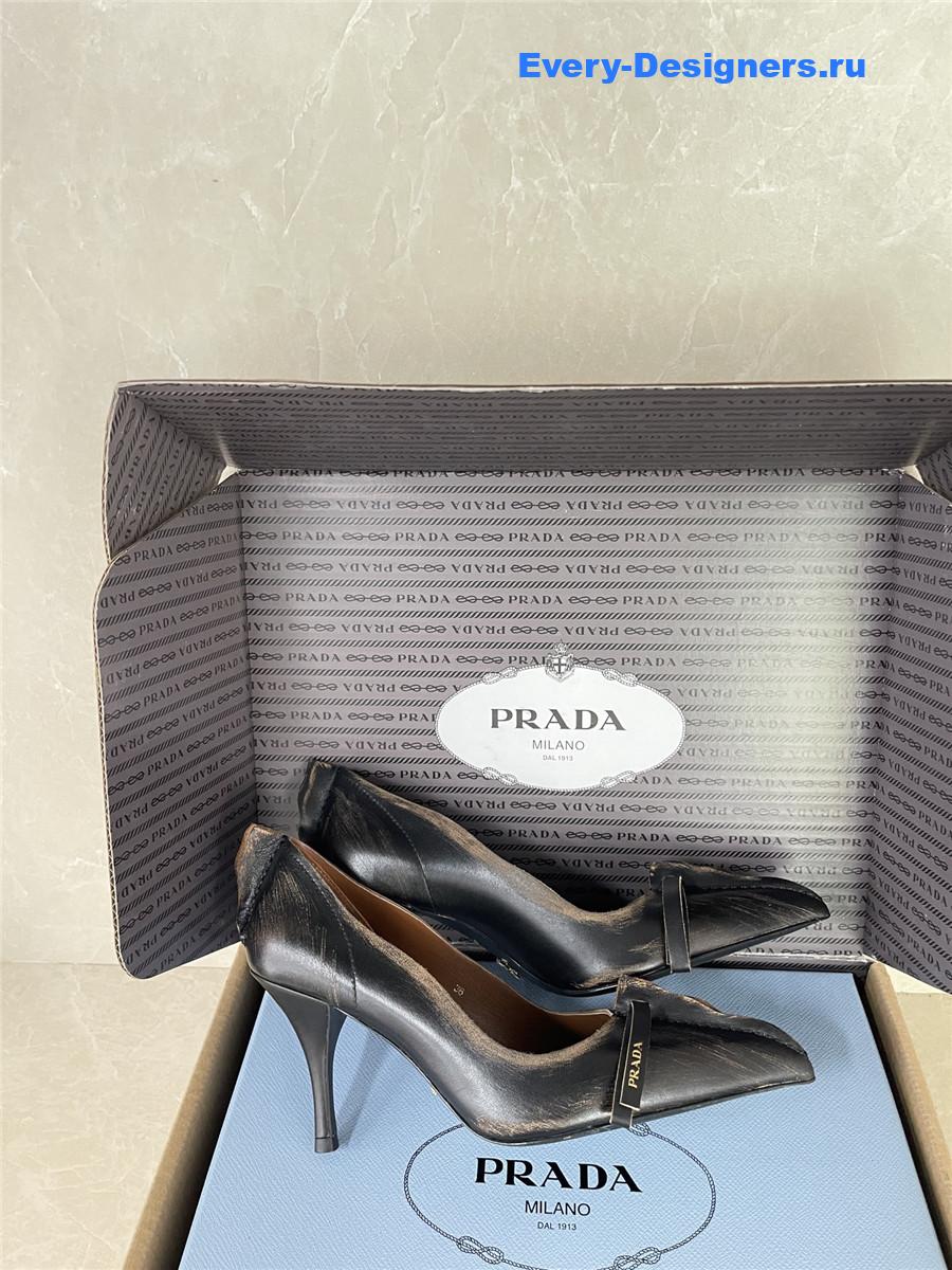 Pra*a black leather bow pumps